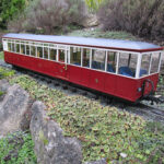 New Carriage 100 kit, assembled, painted and completed with addition of couplings and decals (Not supplied).