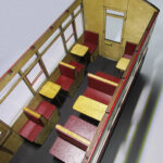 Carriage 106 Modern, assembled and painted third class saloon interior.