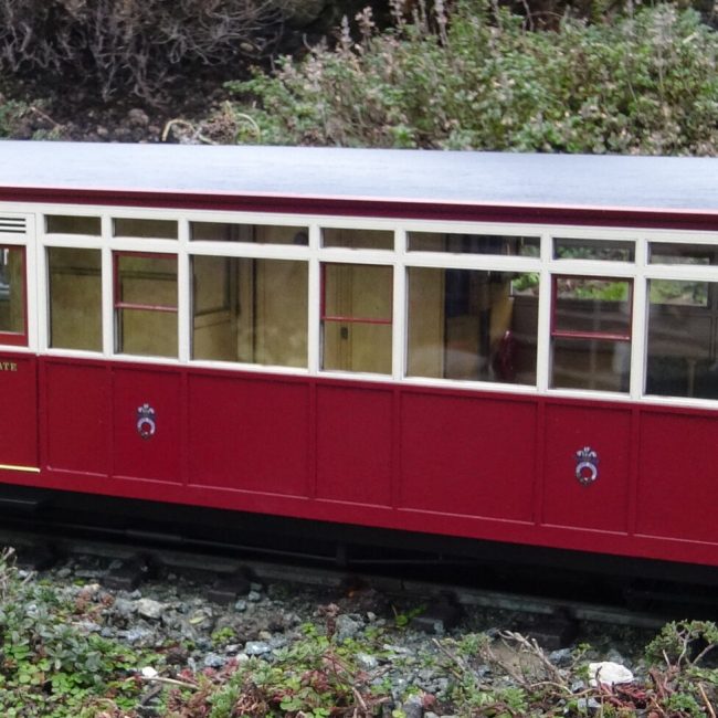 Carriage 124 Kit, assembled, painted and completed with addition of couplings and decals. (Not Supplied)