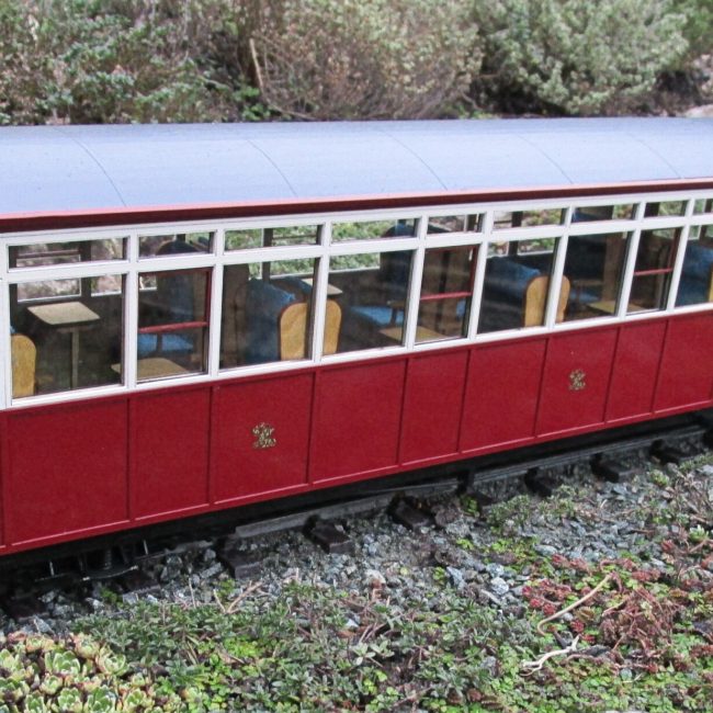 New Carriage 100 kit, assembled, painted and completed with addition of couplings and decals (Not supplied).