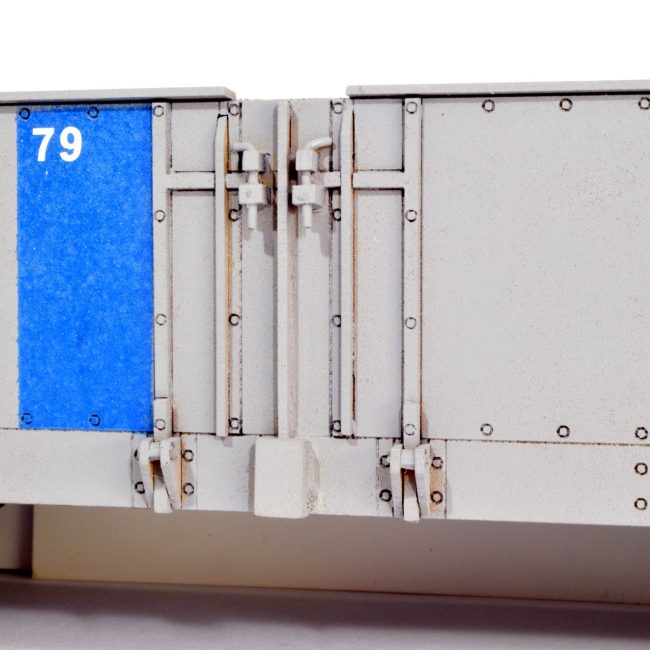 A close up view showing the dropside door hinge detail